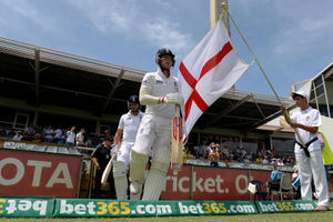 England's Matt Prior (left) and Ben Stokes (right) take to the field