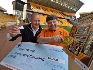 Supporting image for story: Wolves fan scoops £100,000 on National Lottery scratchcard