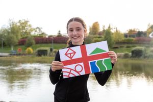 Telford flag competition finalist, Mhairi, with her design. Picture: Telford & Wrekin Council