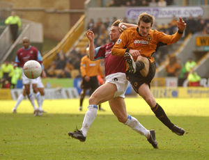 Lee Naylor under pressure from West Ham's former Wolves loanee David Connolly