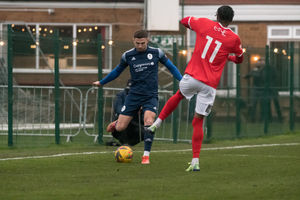 Stourbridge FC player trying to block Arlen Birch cross (pic Kieren Griffin)