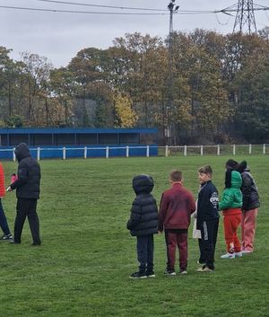Kids lined up for the penalty shootout