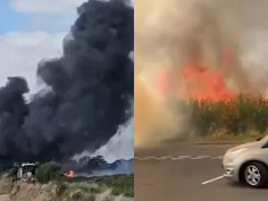 Supporting image for story: Moment thick black smoke billows from West Midlands fire as flames tear through field
