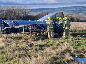 The pilot was airlifted to hospital after crash-landing in a field.
