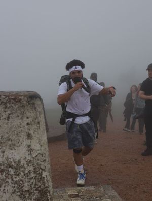Telford rapper Trademark Blue hiked up the Wrekin, rapping non-stop with a PA system strapped on his back, to raise funds for charity. Picture: Krisography