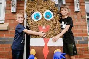 The Wolarski boys with their Spongebob Squarepants scarecrow