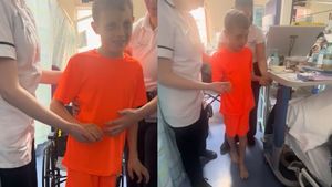 Jacob takes his first steps following emergency brain surgery.