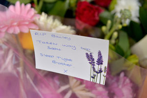 Tributes have been left in Walsall town centre after Bailey Atkinson was killed