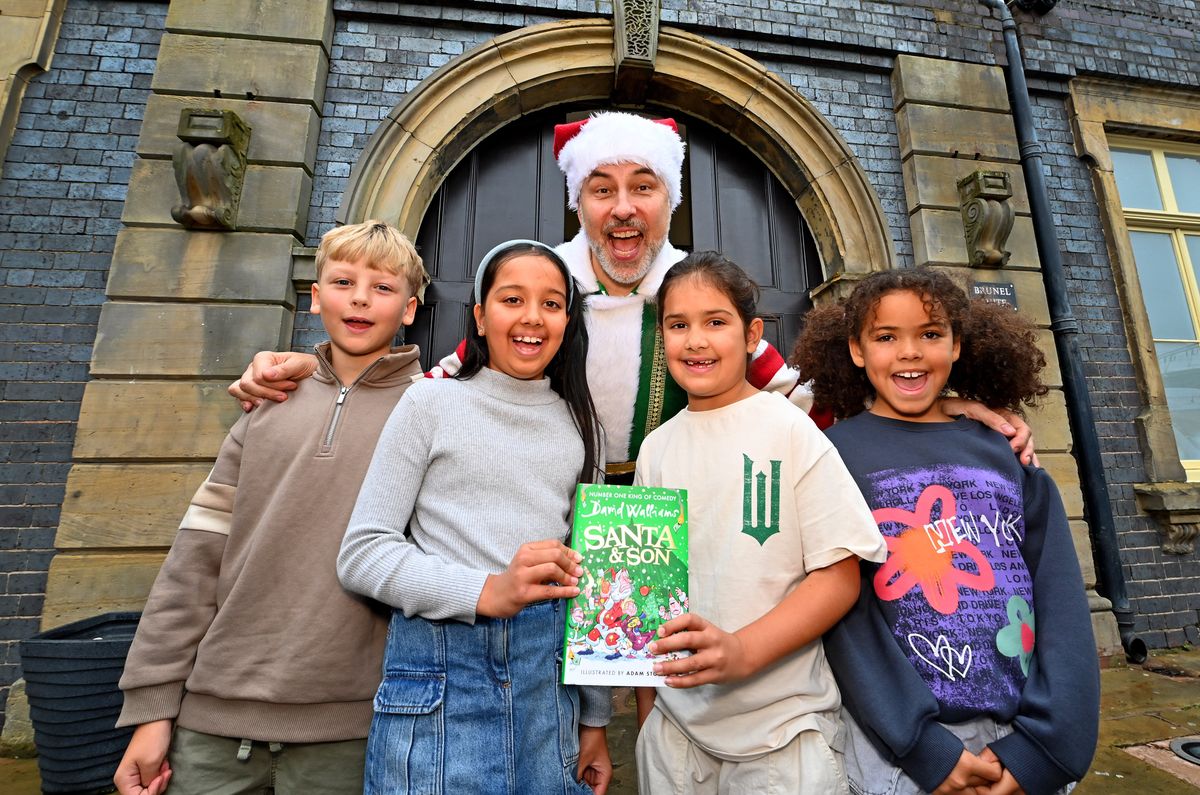'Being different is a superpower!' Comedian and author David Walliams shares love for reading during surprise visit to 800 Wolverhampton children