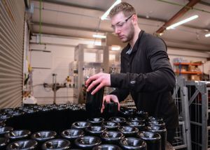 Harrison Crumb at work on the bottling line at Halfpenny Green Wine Estate on Tuesday, February 4, 2025.