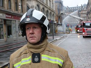 Supporting image for story: Firefighters’ ‘huge effort’ stopped blaze spreading to hotel, officer says