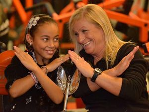 Supporting image for story: Hostage victim schoolgirl who stole Simon Cowell's heart to treat coach who helped her to X Factor show