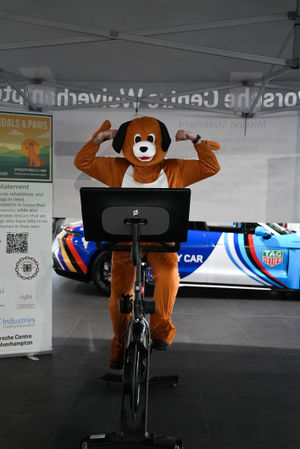 Associates at Porsche Centre Wolverhampton have exceeded a continuous 1074-mile fundraising cycle to raise funds for a local charity