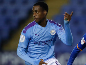 Supporting image for story: Shrewsbury Town sign Manchester City left-back Nathanael Ogbeta on 18-month deal