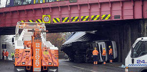 This was the scene in Tipton this morning after an HGV overturned after ploughing into a Metro bridge.