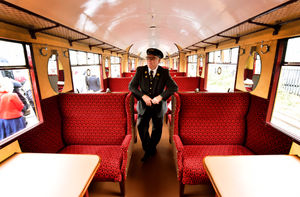 The legendary Flying Scotsman arrives at Severn Valley Railway. Travelling ticket inspector Ian Powick in the plush interior of the train.