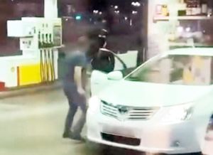 The moment robbers targeted a driver at a Shell petrol station in Birmingham