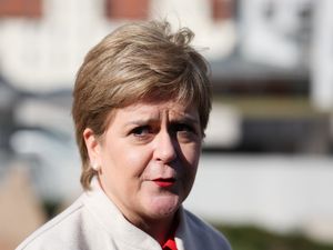Nicola Sturgeon pursing her lips