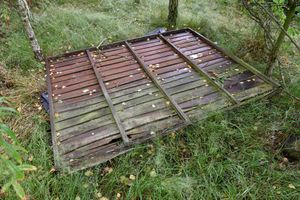 A broken fence panel