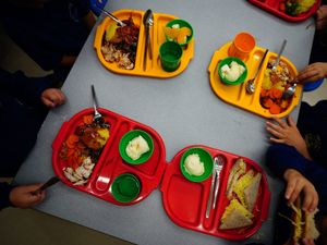 Pupils eating school meals