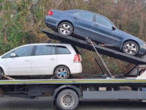 Supporting image for story: Two 'abandoned' cars seized by police in north Shropshire village car park