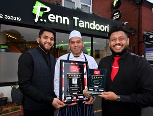 From left: head waiter Yaqub Bin Shakil, chef Mohammed Hussain Ahmed and manager Rahan Hussain celebrate Penn Tandoori's award success. Photo: Tim Thursfield
