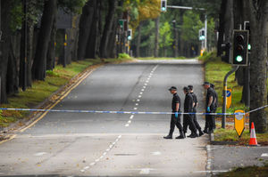 Police search teams at the scene on Sunday morning. Photo: SnapperSK