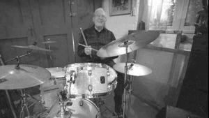 At 82, Peter is still drumming to help raise funds for Cancer Research UK.
