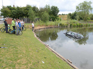 Supporting image for story: Fishing lake drama in Bilston as car plunges into water