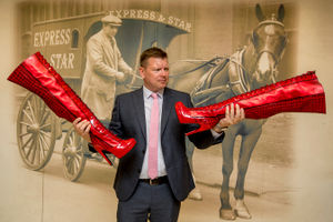 Express & Star editor Keith Harrison with the famous boots