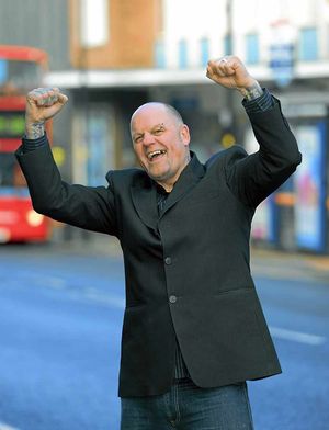 A triumphant Paul after being offered a job