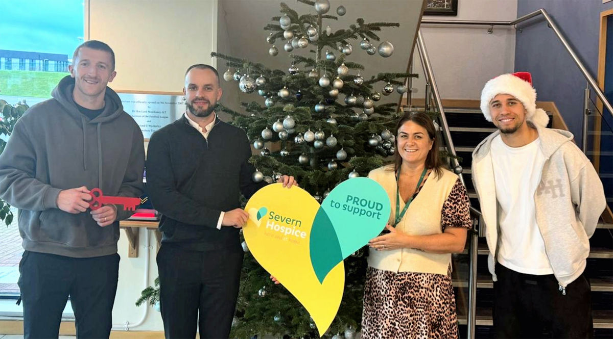 Business makes a 'tree-mendous' donation to Shrewsbury Town Football Club and local hospice