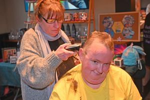 Tracey Beales in Stafford during the sponsored head shave in aid of the Douglas MacMillan Hospice. 