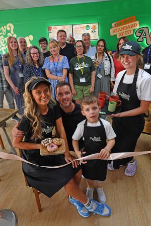 Austin's Coffee opened its doors on June 30 in the former Blunts Shoes building within Provision House, Dudley . Front left, Amy Austin White, husband Greg and son Zechariah, five, with assistant Emma Fellows.