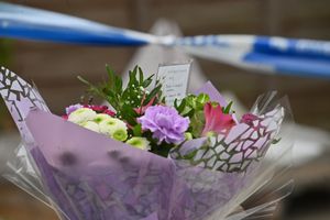 Floral tributes at a house where Anjanee Sandhi was found.