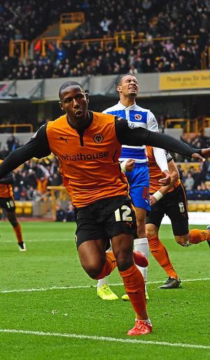 Benik Afobe of Wolverhampton Wanderers celebrates after scoring a goal.