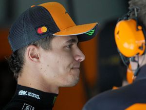 McLaren driver Lando Norris of Britain prepares in the pits