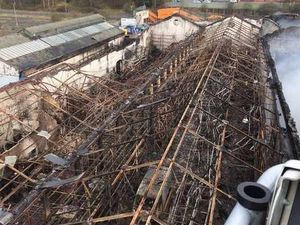 Supporting image for story: Empty warehouse shell shows devastation caused by Smethwick fire