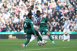 Japhet Tanganga of Millwall blocks a shot from Josh Maja (Photo by Adam Fradgley/West Bromwich Albion FC via Getty Images).