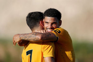Morgan Gibbs-White celebrates with Pedro Neto (Getty)