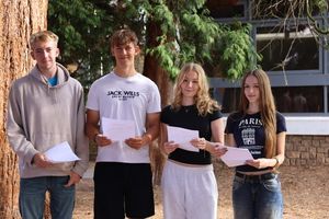 George Branagh, Aaron Mills, Lucy Ratcliff and Elizabeth Devney celebrate their results at King Charles