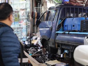 Supporting image for story: Two killed after truck ploughs into South Korea market