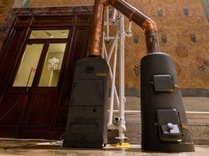 Supporting image for story: Vatican workers install Sistine Chapel stove ahead of conclave