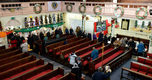 Pensioners queue at St Leonards Church, Bilston, to collect their £5 Christmas vouchers