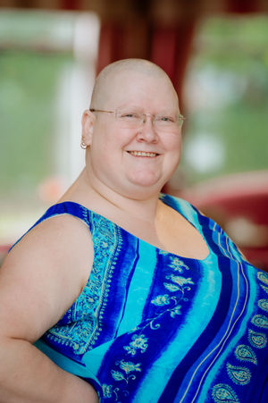 Sam Davis strikes a pose after her shave