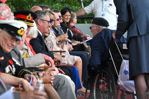 Prime Minister Sir Keir Starmer speaks with a military veteran during the national Service of Remembrance, hosted by the Royal British Legion in partnership with the Government, to mark the 80th Anniversary of VJ Day at the National Memorial Arboretum in Alrewas, Staffordshire. Picture date: Friday August 15, 2025. PA Photo. Photo credit should read: Anthony Devlin/PA Wire 
