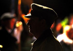 A silhouetted figure at the Market Drayton ceremony
