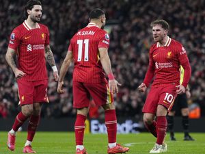 Alexis Mac Allister, right, celebrates with team-mates after scoring Liverpool's second goal against Newcastle