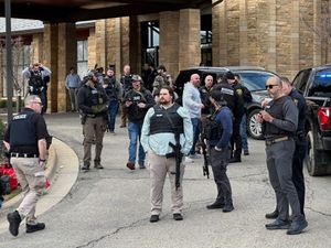 Supporting image for story: Armed man shot dead after ramming vehicle into Michigan synagogue – reports