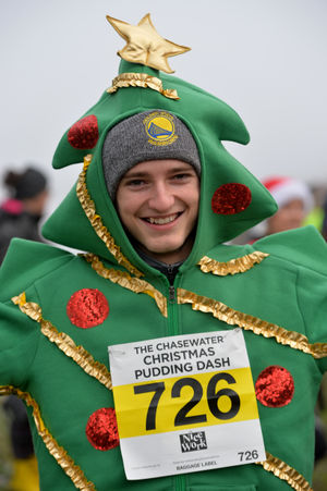 Jack Taylor dressed as a Christmas tree for the event.